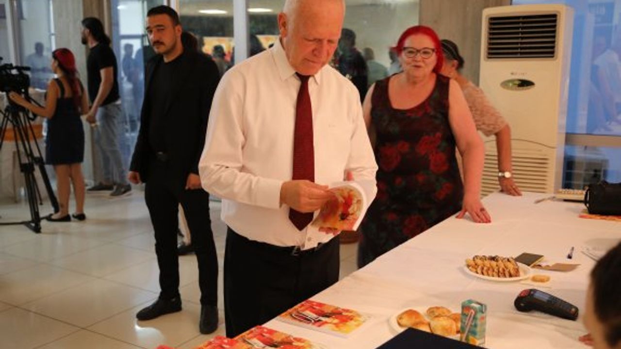 Töre, Bülent Günkut’un kitap tanıtımı ve fotoğraf sergisine katıldı