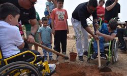Ortopedik Özürlüler Derneği’nden Derinya’da ağaç dikme ve piknik etkinliği